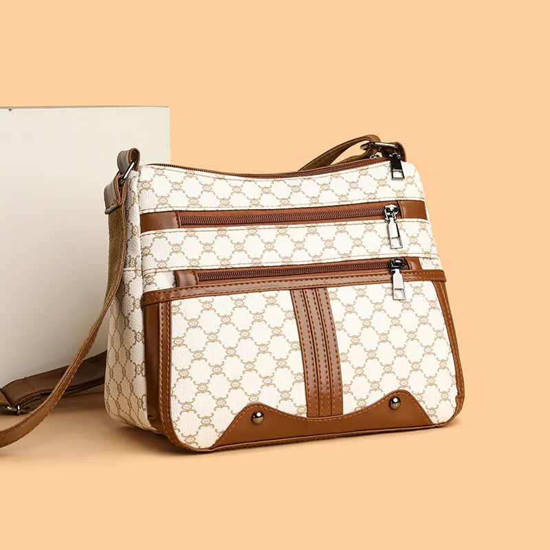 Women's brown stitching pattern crossbody bag made from PU leather with large interior capacity