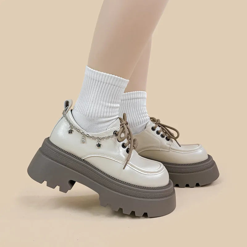 White women's platform Mary Jane shoes with round toe, front lace-up, and a chunky heel