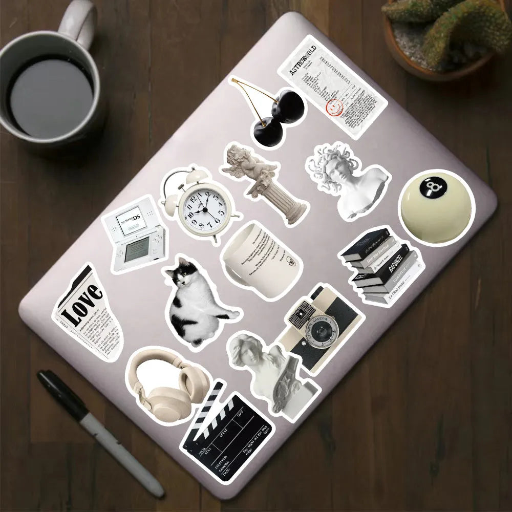 61 black and white waterproof PVC stickers for laptop and phone decoration.