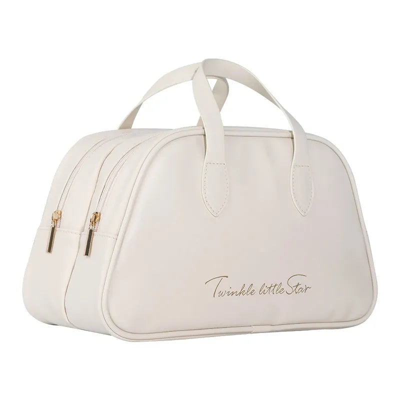 Large capacity PU leather travel toiletry bag in caramel mocha colour showing dry wet separation compartments.