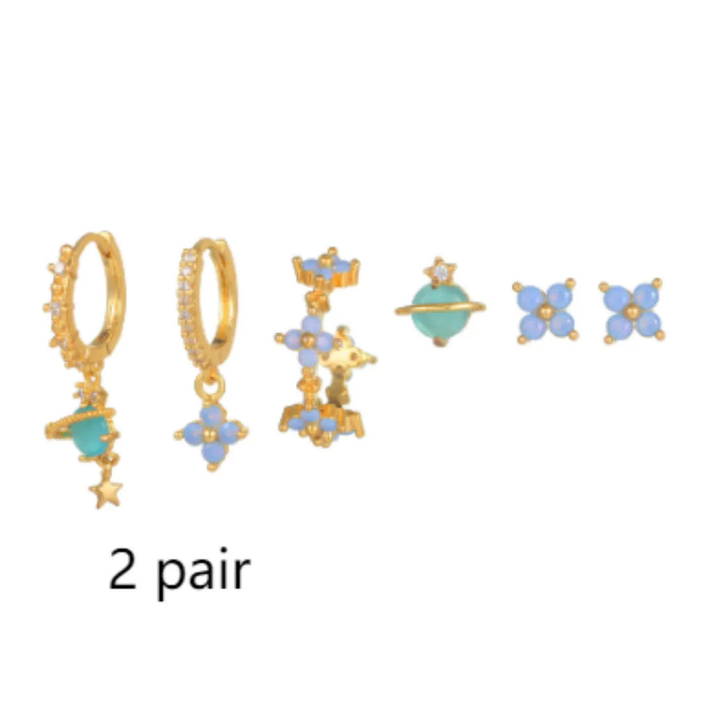 Gold and silver floral stud earrings with zircon detail in a Japanese Korean sweet girl style.