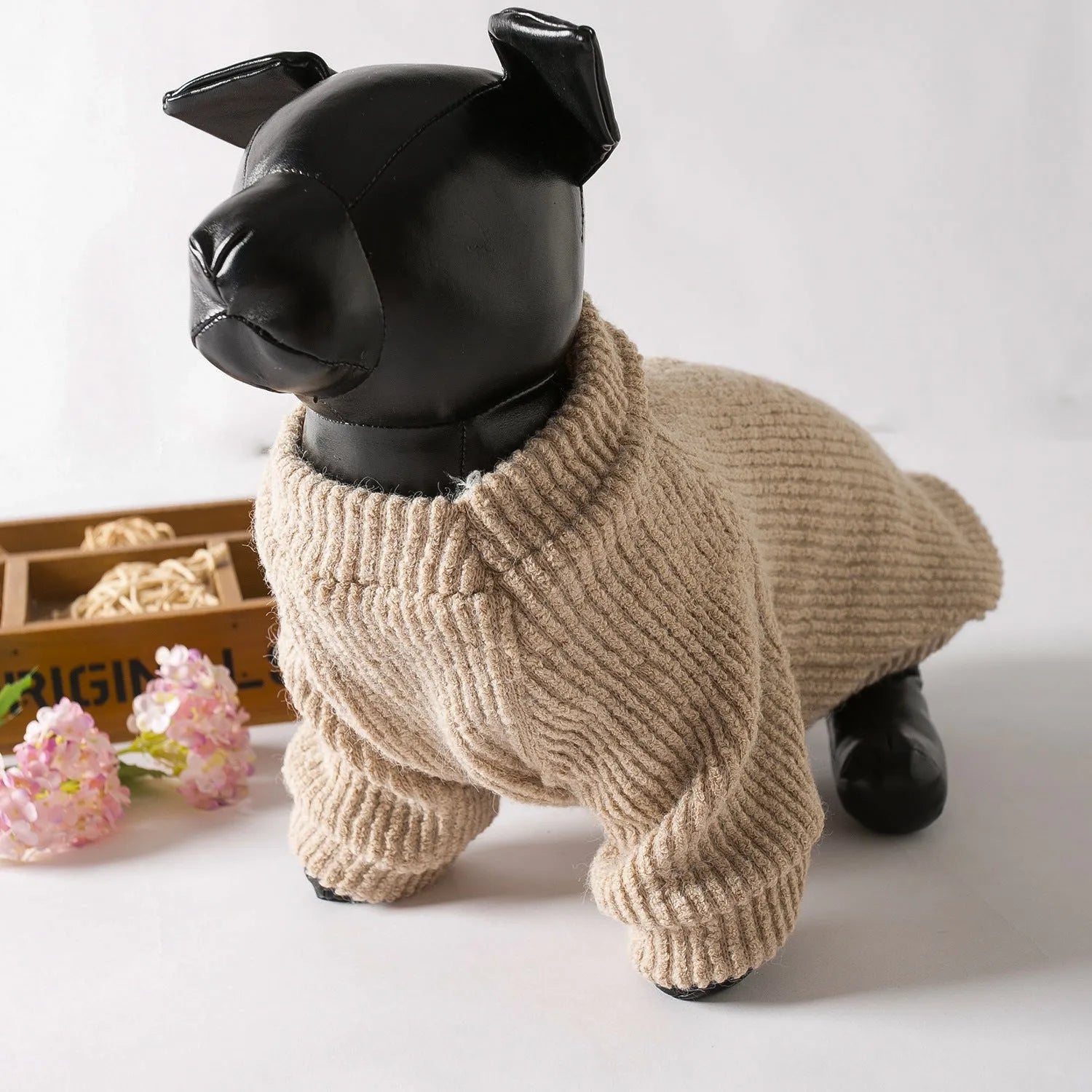 Brown cloth pullover sweater on a small dog, showing casual design and comfortable fit.