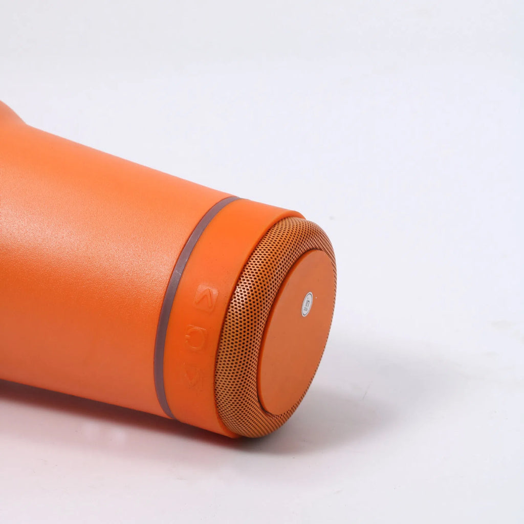 30oz Bluetooth Audio Cup in pink with 304 stainless steel insulation, showing speaker and drink opening