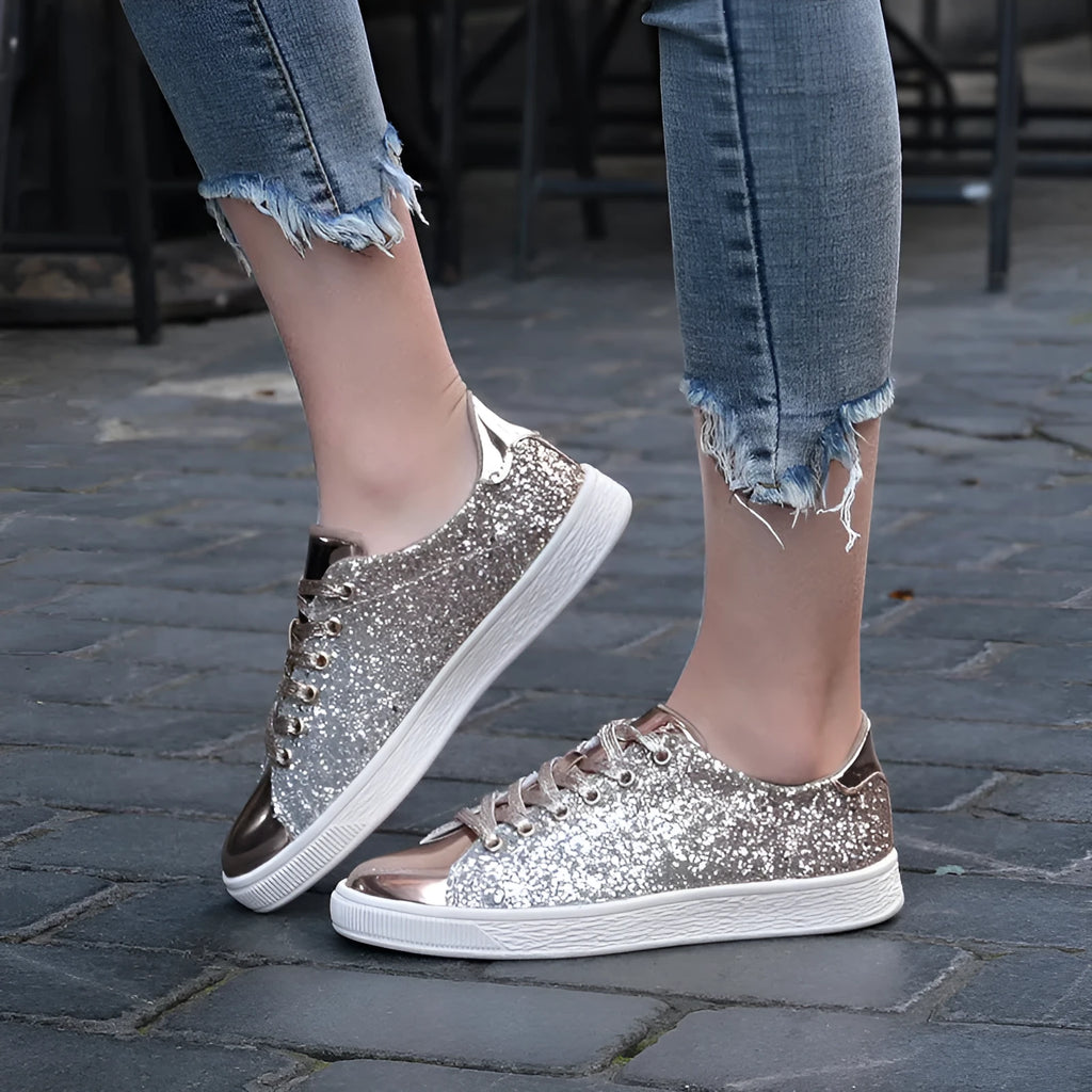 Women's black sequinned lace-up casual shoes with a round toe and rubber sole, shown from the side.