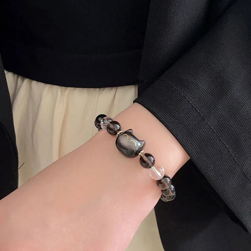 Women's silver bracelet with 8mm natural opal stone and cat head motif design