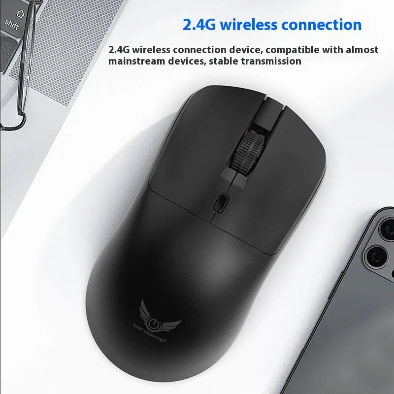 Black wireless computer mouse with three audio control buttons on side