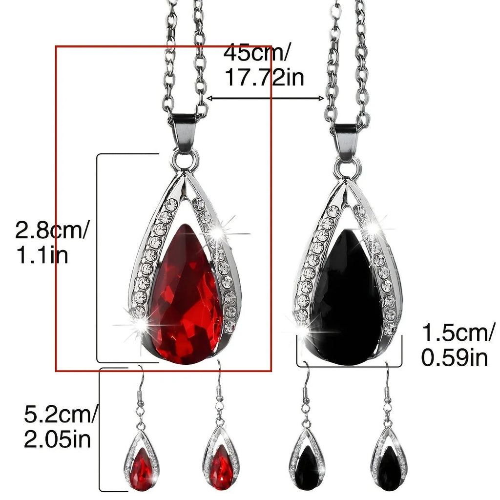 Teardrop pendant necklace and matching earrings jewellery suite in alloy with black or red glass accents