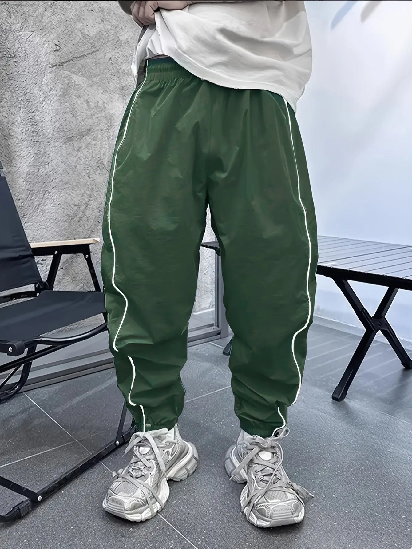 Men's loose fit casual sports trousers in bamboo fibre, shown in cropped length and a colour option like blue.