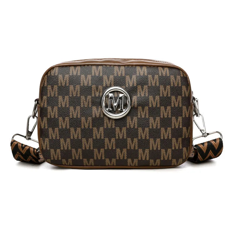 PU leather crossbody bag with wide adjustable strap and three-dimensional pocket in black colour