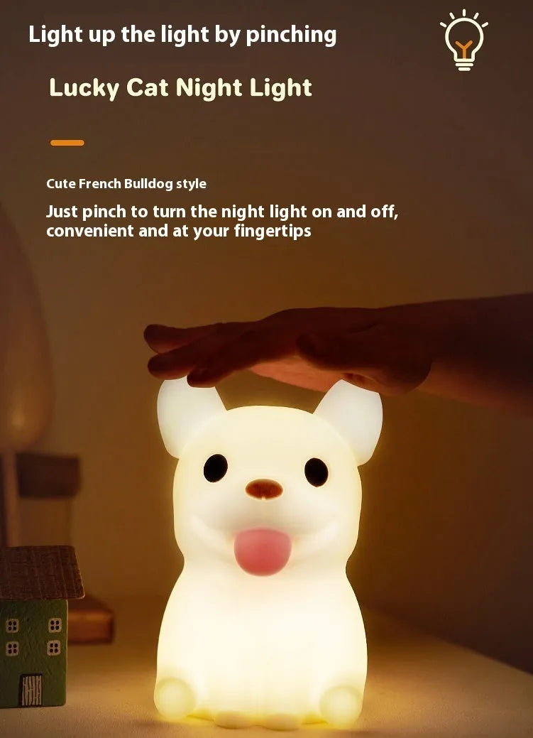 Silicone animal night light with USB charging port and touch dimming control in cartoon ox design