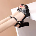 Women's black and white high heel sandals in PU material available in sizes 35 to 42