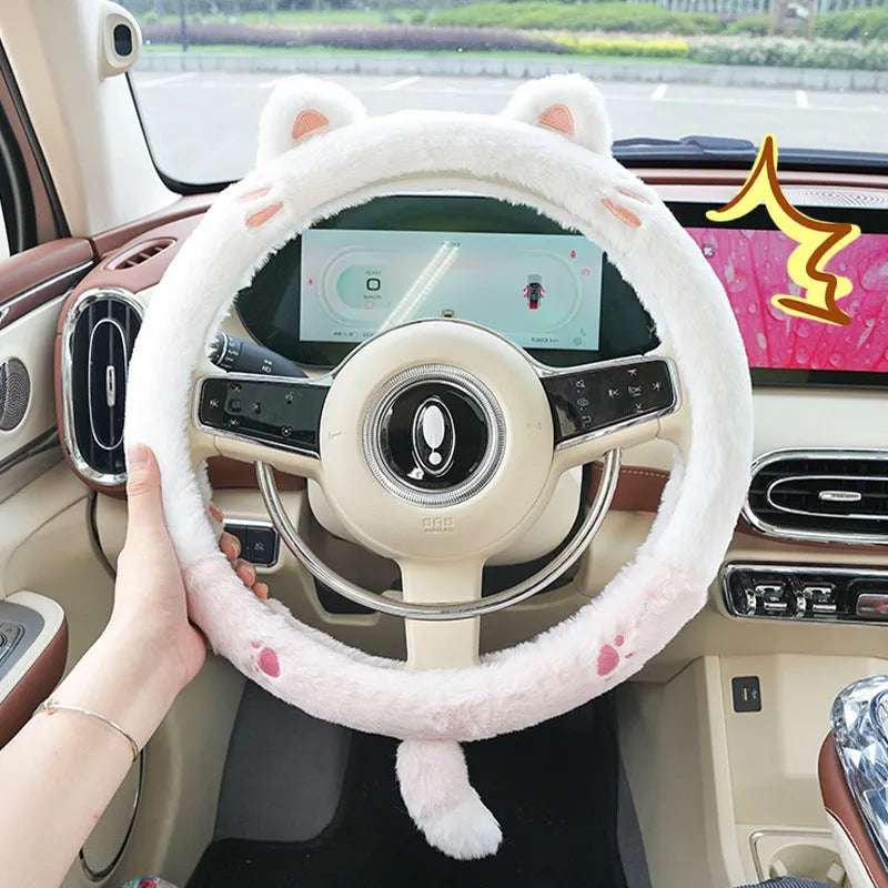 Plush rabbit fur winter steering wheel cover with cute embroidered panda design, shown fitted on a car steering wheel.