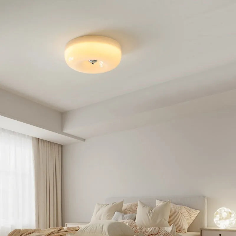 Cream coloured American style bedroom ceiling light with a three-colour light function.