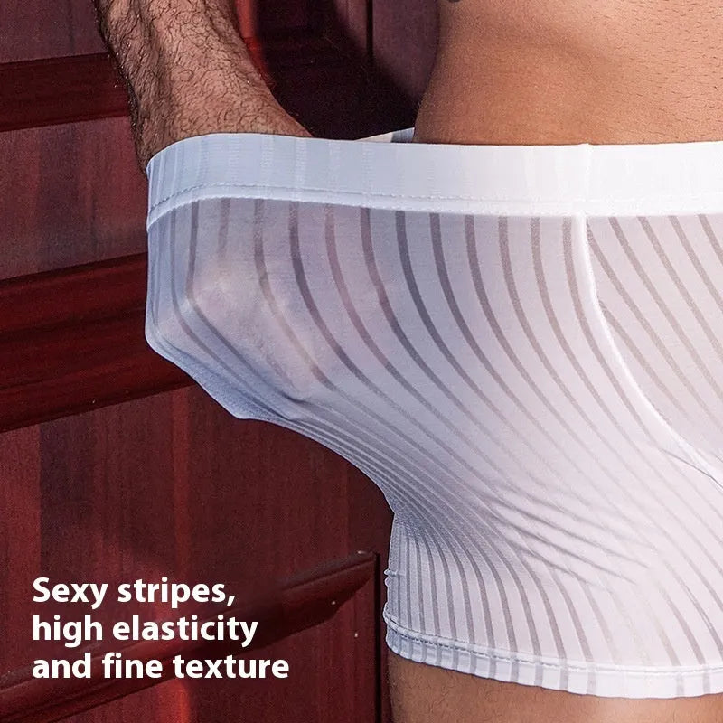 Men's black striped nylon boxer briefs laid flat, showing elastic waistband and leg openings.