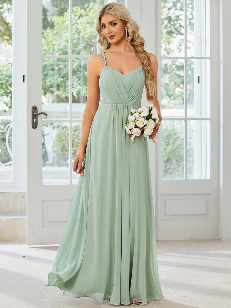 Women's sleeveless A-line long dress with pleated skirt detail in solid colour