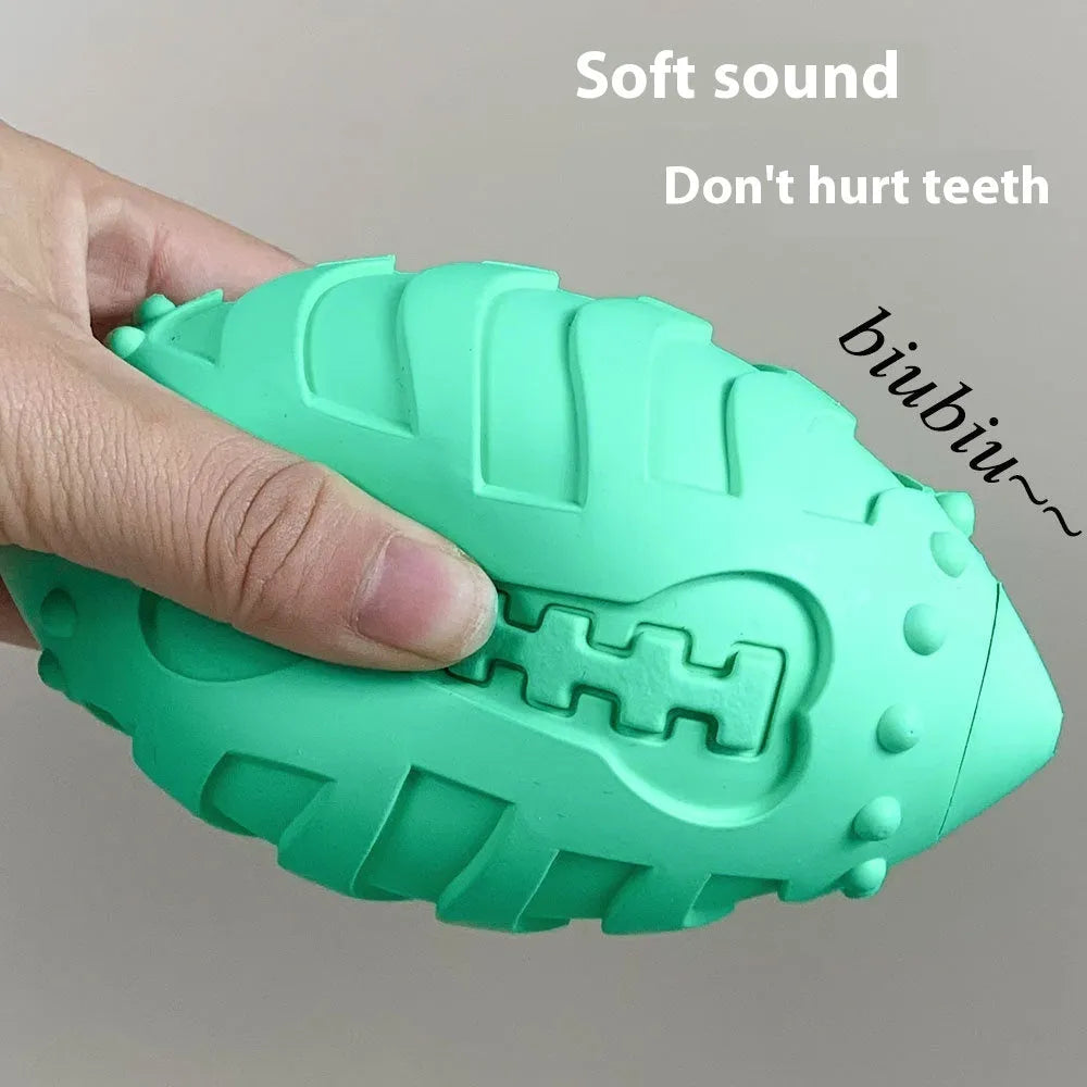 Light green bite-resistant rubber rugby ball dog toy with textured surface for teeth cleaning