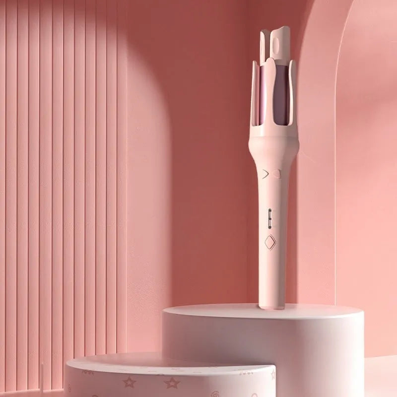 White and Chigo brand automatic hair curler with a 32mm barrel on a table.