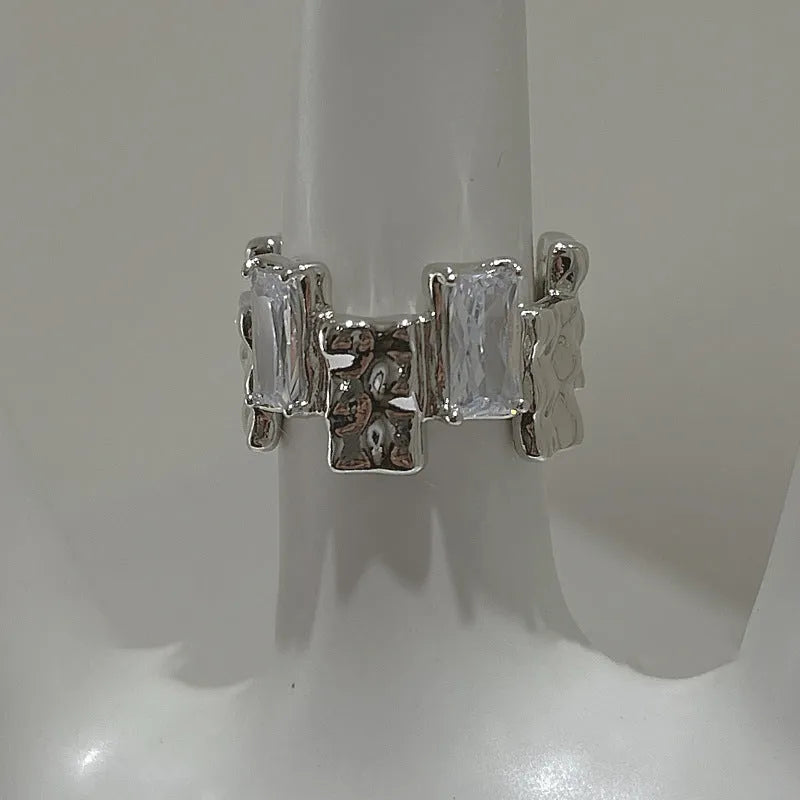 Geometric silver zircon ring with open design and three-dimensional retro decorations