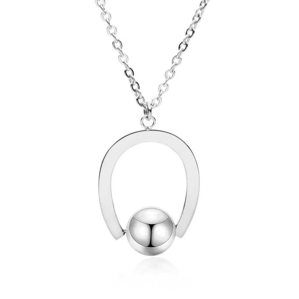 Adjustable stainless steel necklace with cross chain design and geometric pendant in gold colour.