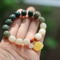 Natural Bodhi root bracelet with gradient white jade and beeswax floral beads