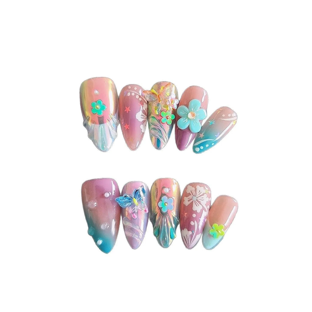 Handmade floral and butterfly nail art sculptures in four sizes for 3D manicure decorations