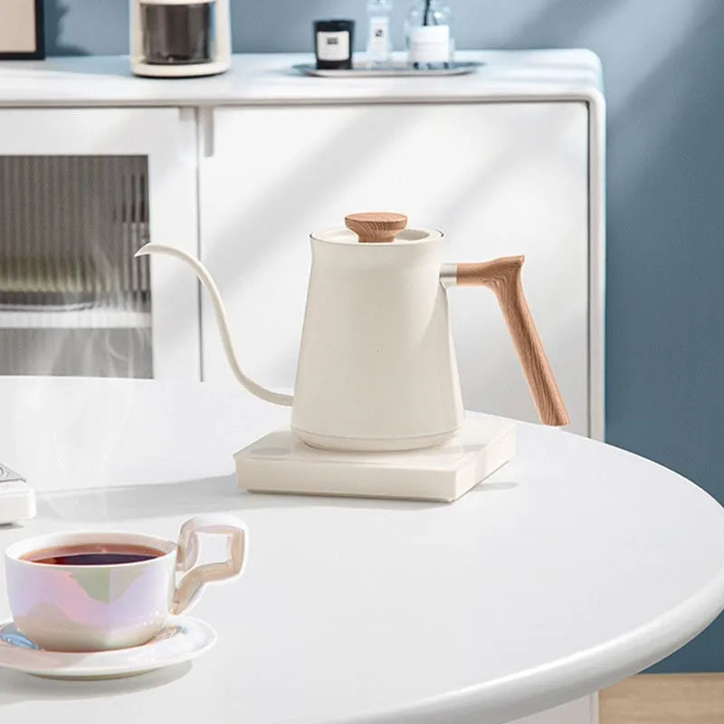 Intelligent temperature controlled hand brewed coffee pot in retro style, available in matte black or cream white, with UK electrical plug