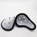 Rubber sports genital protector groin guard for adult and child sizes, used in boxing rugby hockey and martial arts.