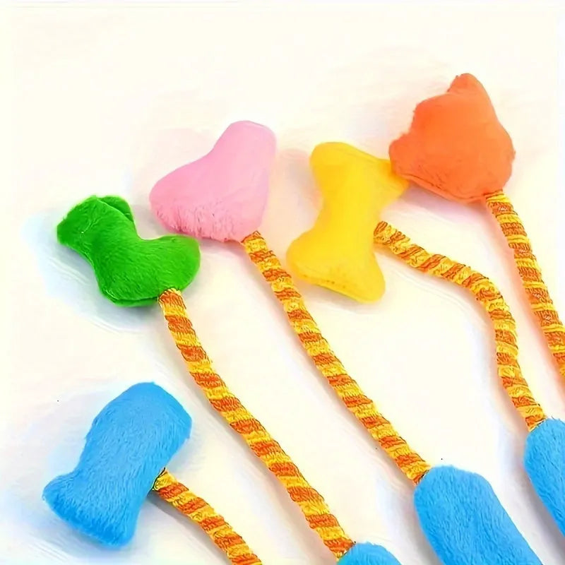 Yellow and blue plush magic glove cat toy with bell, shown with dimensions 40cm by 11cm.
