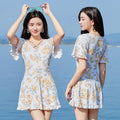 Women's high waist floral print one-piece swimsuit in blue or white pattern