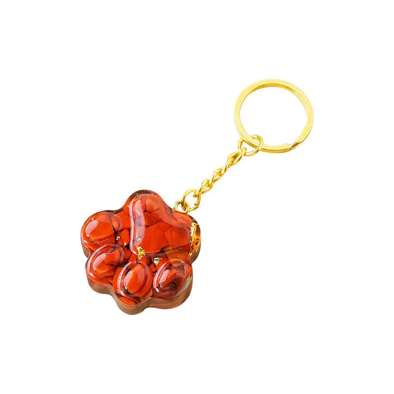 Natural crystal cat's paw keychain pendant in a chosen gemstone like turquoise or amethyst.