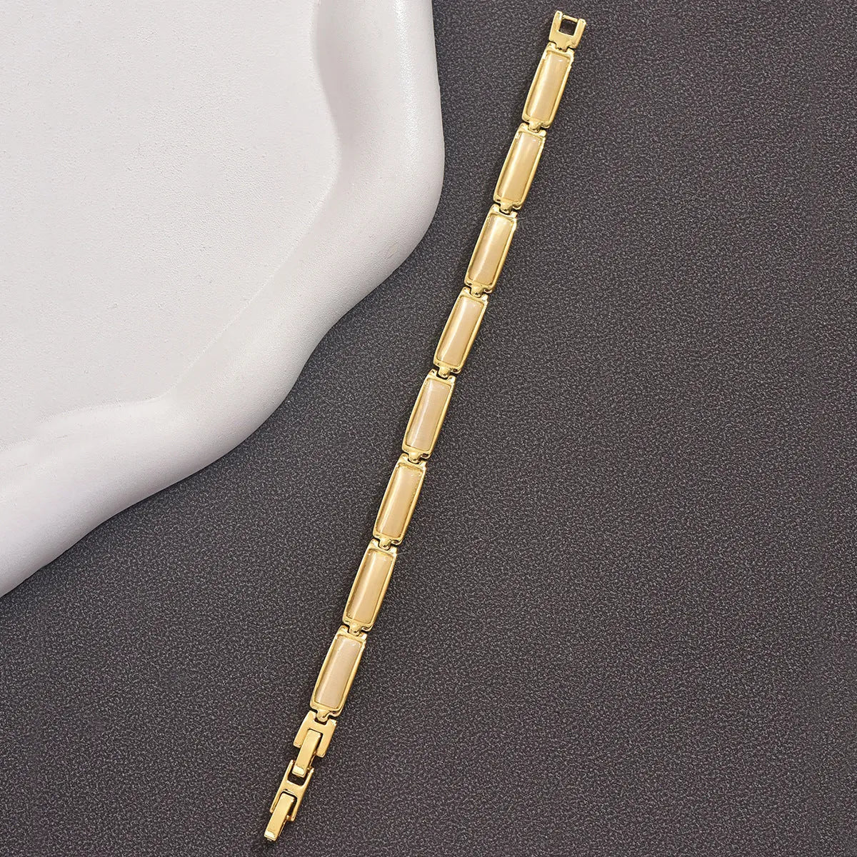 Geometric rose gold alloy bracelet with gemstone inlay for women, quadrilateral shape