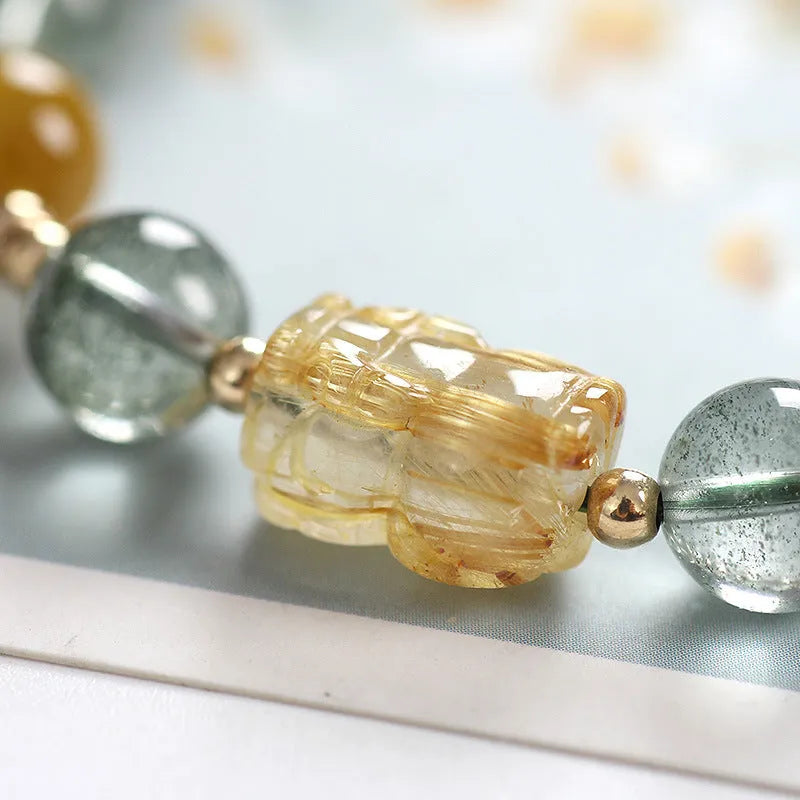 Green phantom quartz crystal bracelet with 8mm beads and gold accents in geometric ethnic style