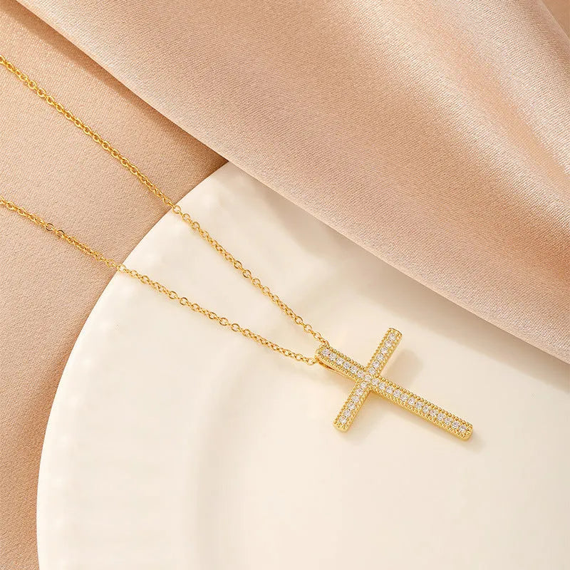 Women's copper necklace showing a choice of butterfly, cross, heart, and round diamond electroplated pendants.