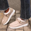 Women's warm plush ankle snow boots with cotton upper cross straps flat heel front tie in black