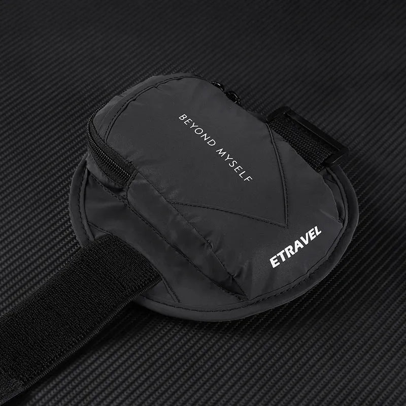 Lightweight reflective running arm bag in black, showing the strap and 7-inch capacity pocket.