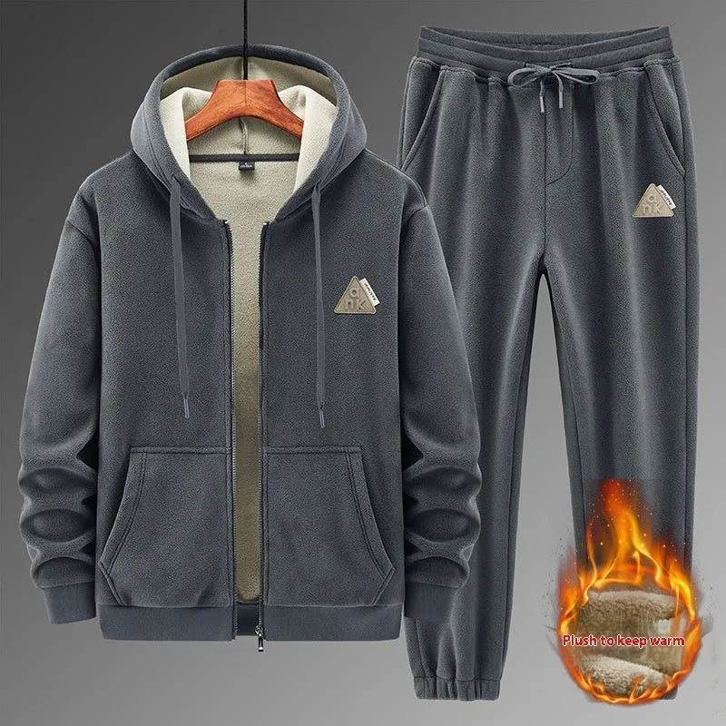 Men's grey cashmere hooded sweater and cotton pants casual sports suit set laid flat.