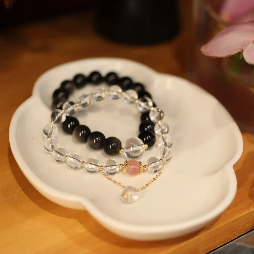 White crystal geometric bracelet with cat eye obsidian and Chinese auspicious patterns