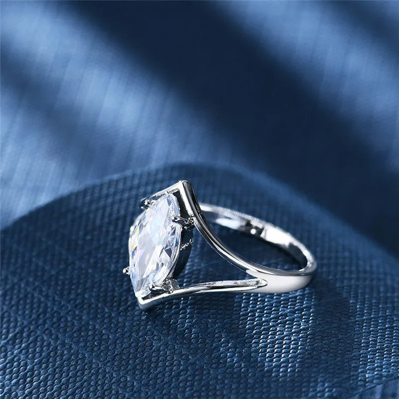 Personalised ling-shaped zircon ring for women, copper construction, white colour option, shown on finger