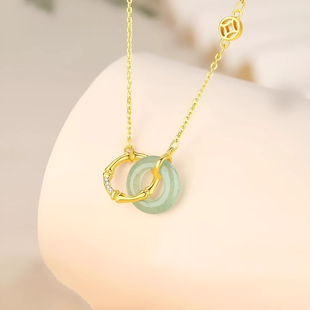Sterling silver necklace with geometric bamboo peace buckle pendant and O-ring chain