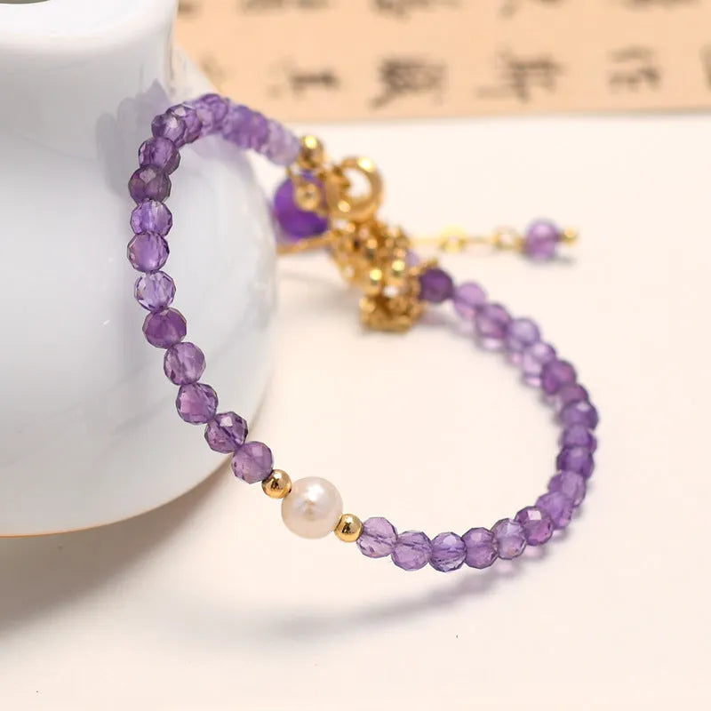 Purple amethyst Chinese style crystal bracelet with diamond shapes and adjustable closure