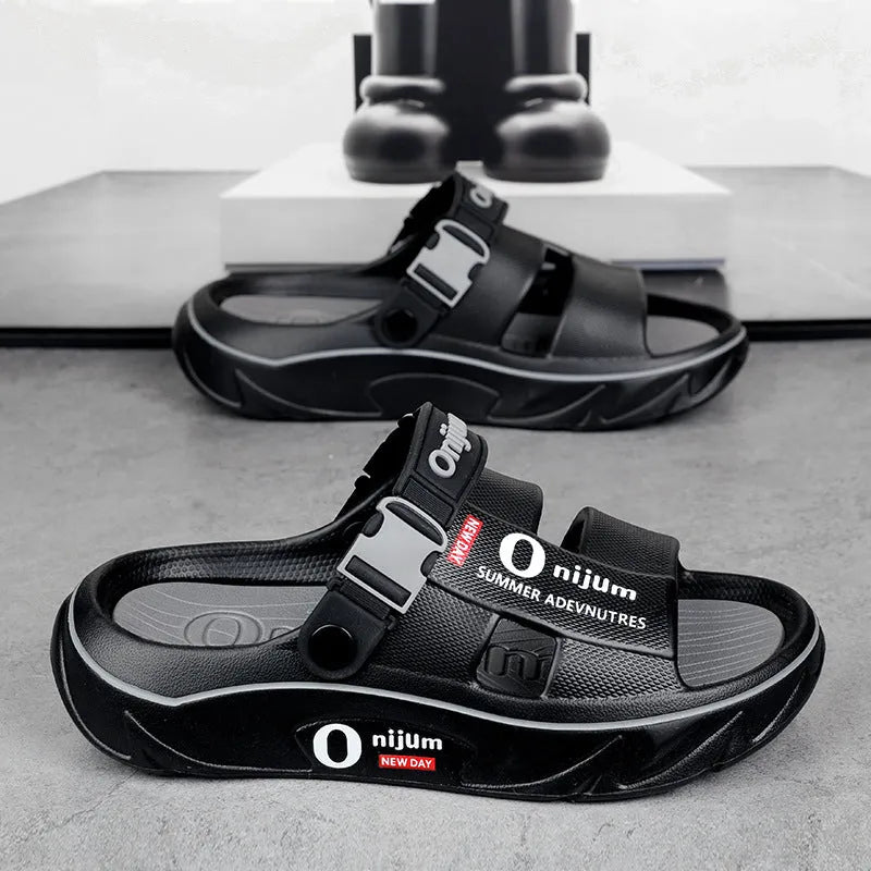 Platform men's sandals with EVA upper and raised sole in black orange colour, side view