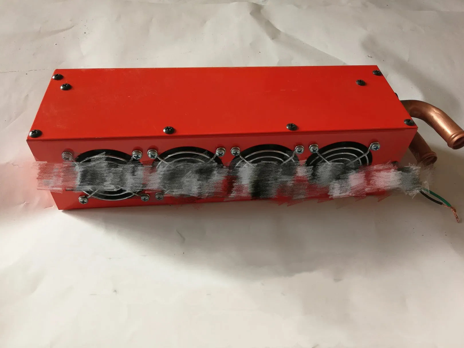 Compact metal car heater with copper pipe connections for 12V and 24V vehicle auxiliary heating