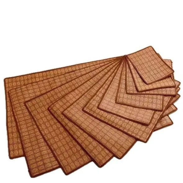 Brown rattan fibre cooling mat for dogs on a wooden floor.