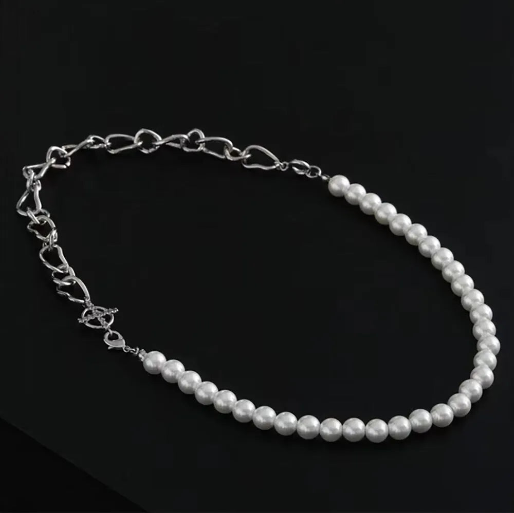 White geometric asymmetric clavicle chain necklace with twisted silver-tone chain and minority design elements