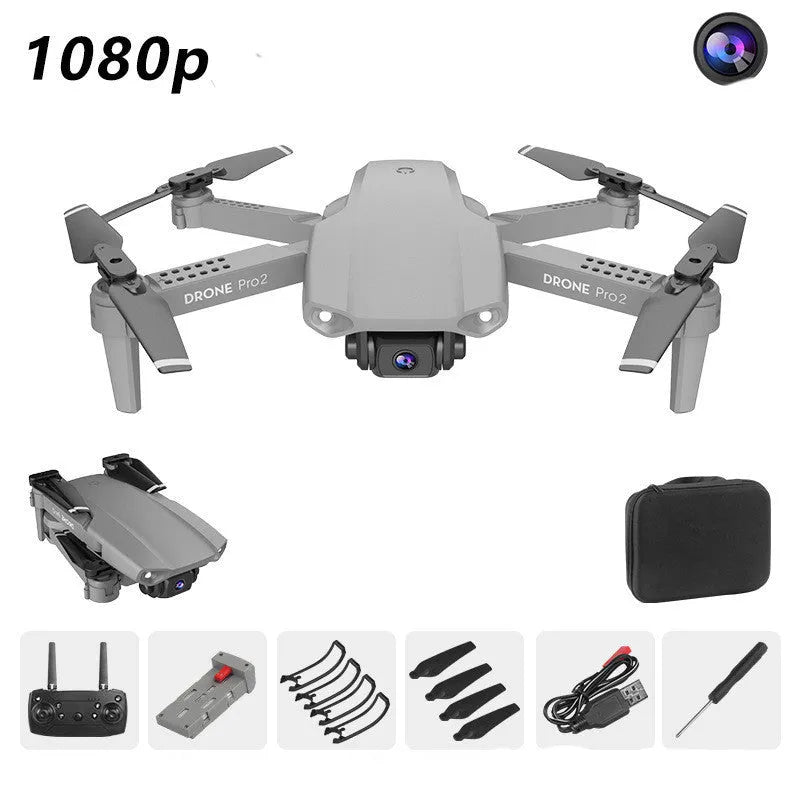 E99Pro2 folding dual camera drone black with propellers on table