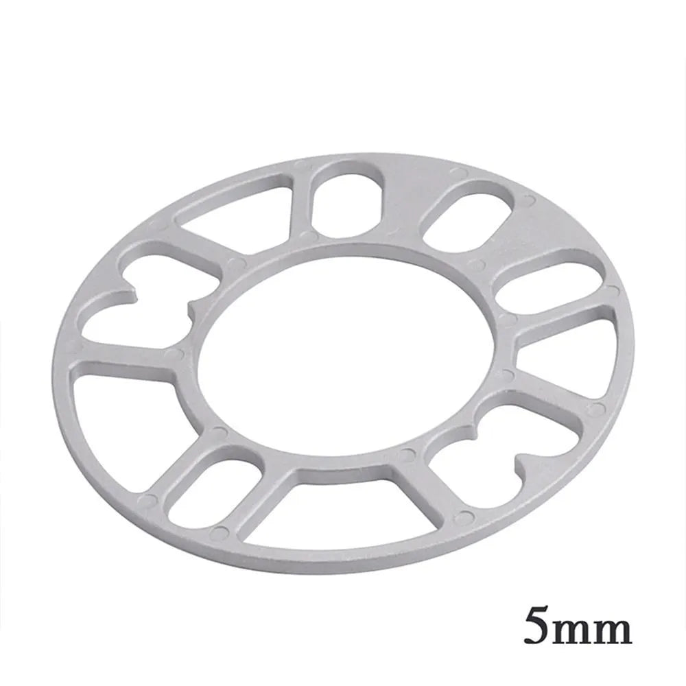 Automotive wheel hub widening gasket spacers in multiple thicknesses for brake caliper clearance