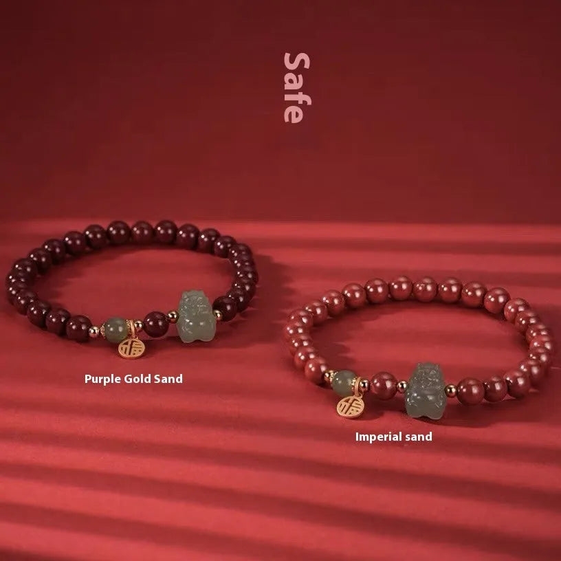Natural Hetian jade bracelet with 8mm beads showing zodiac motifs in emperor sandstone style