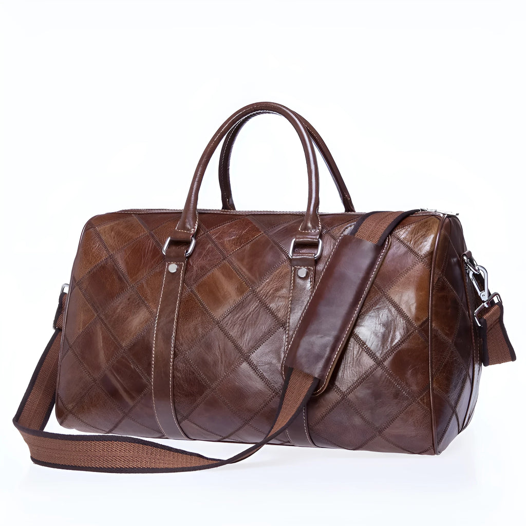 Vintage brown leather men's duffel bag with a single shoulder strap shown open to reveal internal organiser pockets.