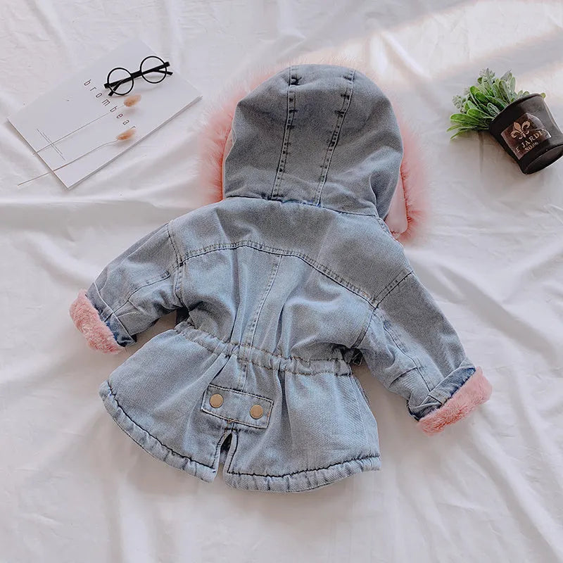 Blue girls' denim coat with a non-removable hood and fleece lining, shown on a hanger.