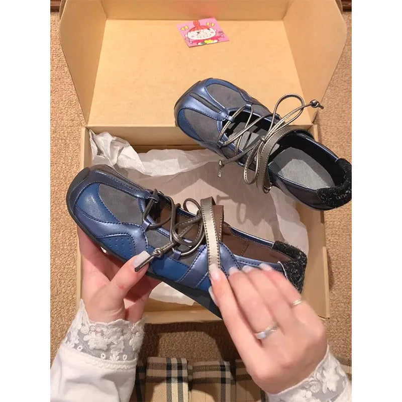 Women's Mary Jane style ballet shoes with round toe and front lace-up closure in artificial leather